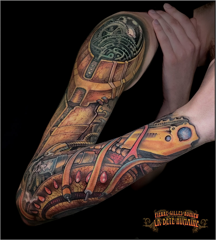 Pierre-Gilles Romieu, tatoueur à Paris - Bras biomécanique coloré et steampunk