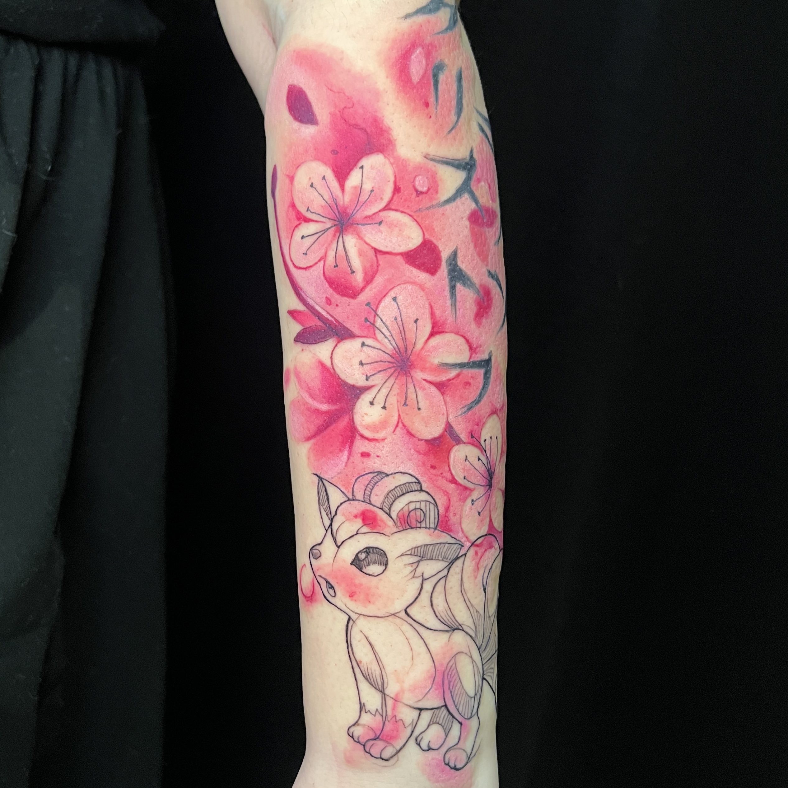 Tatouage fleurs de cerisier et Goupix - La Bête Humaine Paris