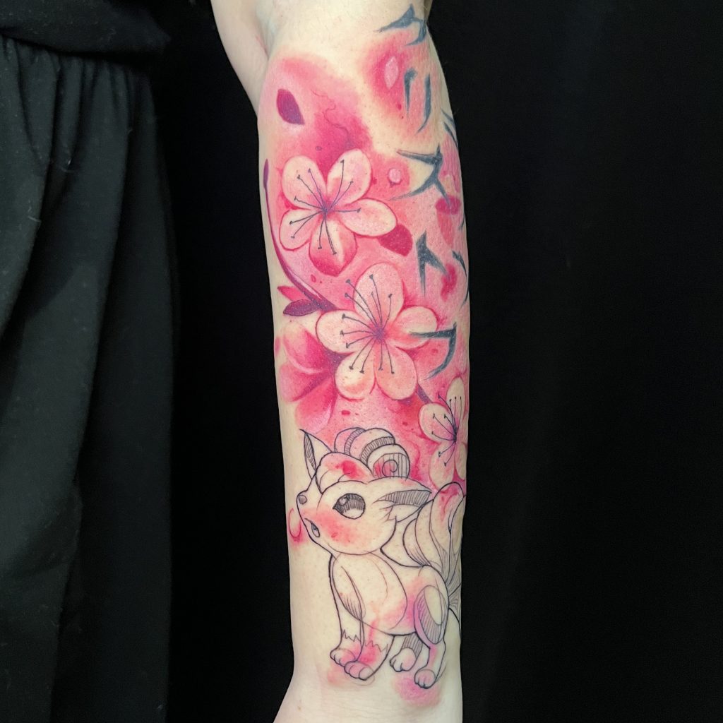 Tatouage fleurs de cerisier et Goupix - La Bête Humaine Paris