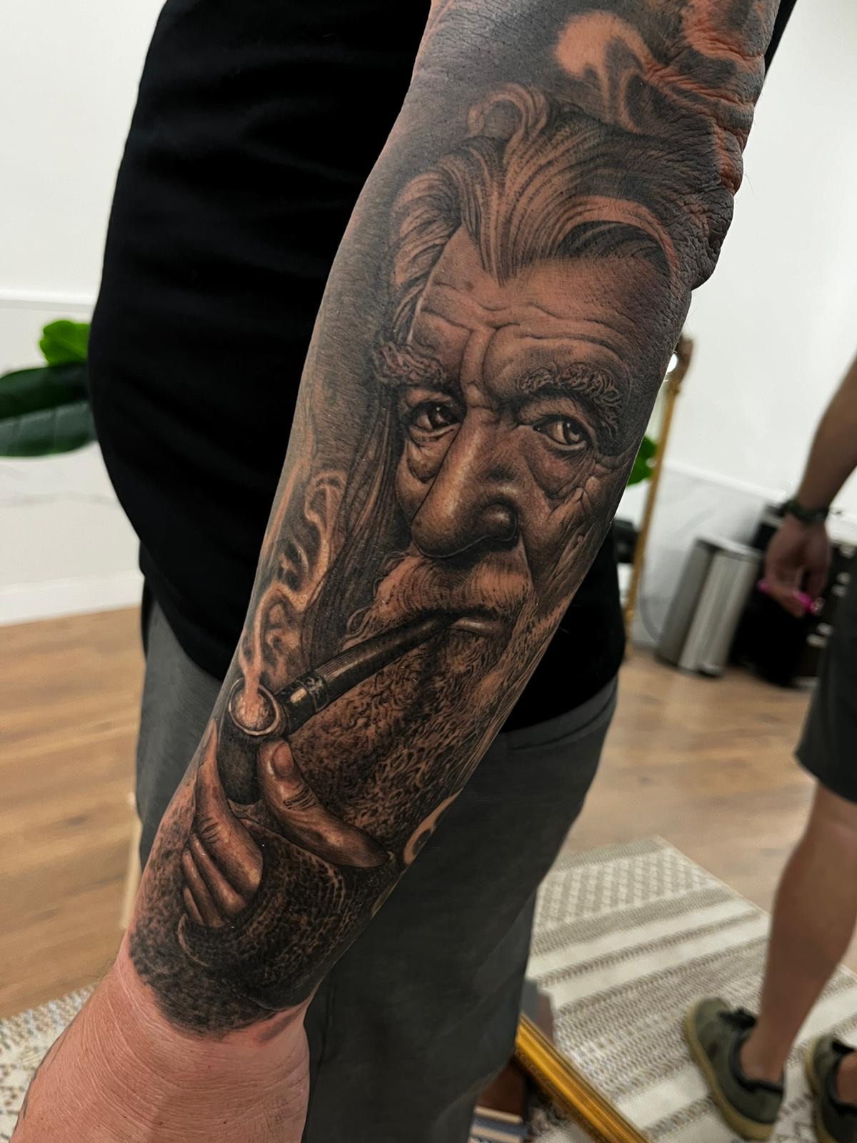 Tattoo portrait in black and grey by Alvaro Sanchez